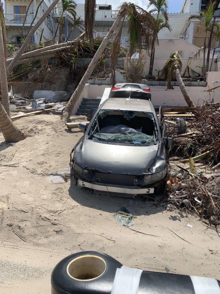 A car completely destroyed by the force of Hurricane Dorian in Elbow Cay